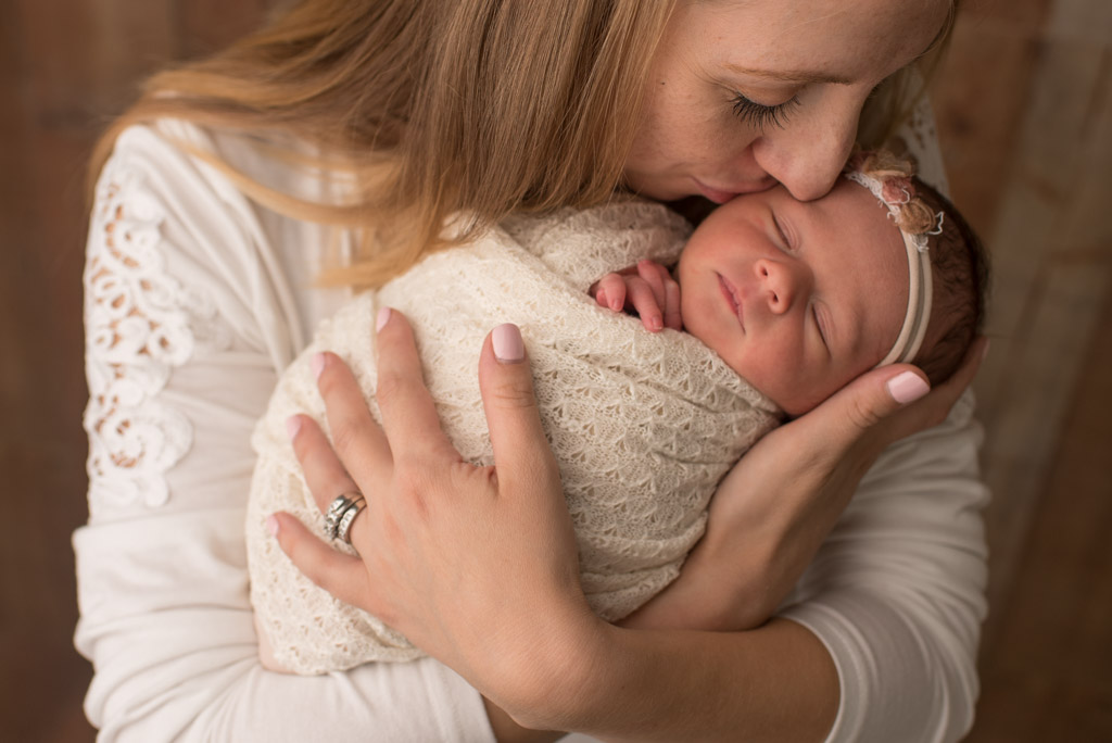 Canton CT Studio Newborn Session | Sharon Leger Photography | Mother kissing newborn daughter