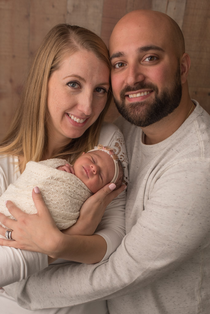 Canton CT Studio Newborn Session | Sharon Leger Photography | Mother and father with newborn daughter
