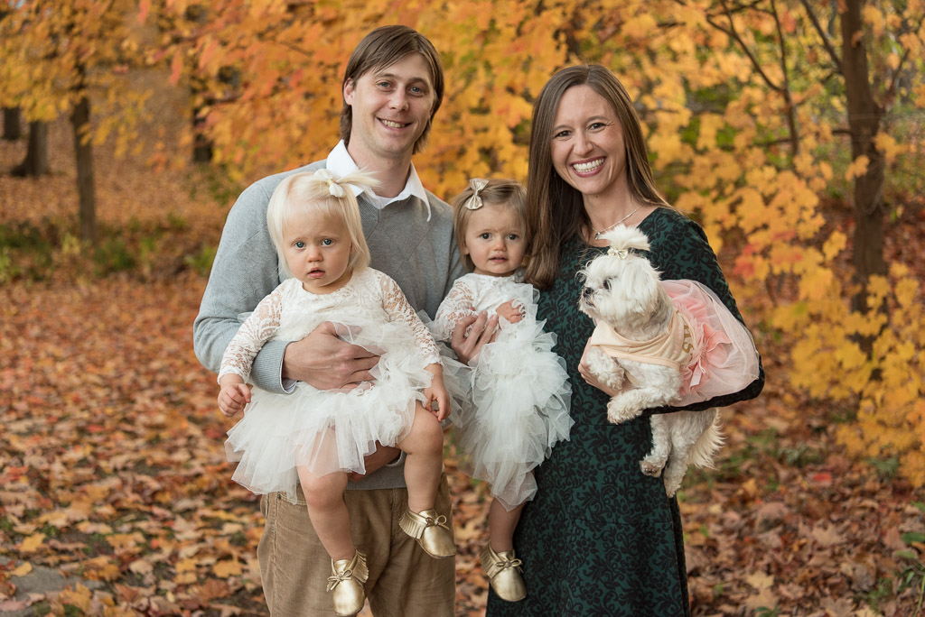 Family of four smiling at the camera | Sharon Leger Photography