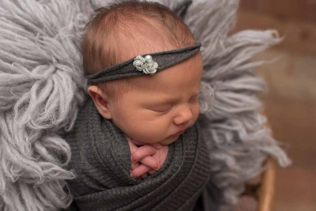 Newborn baby girl at studio newborn session in gray | Sharon Leger Photography