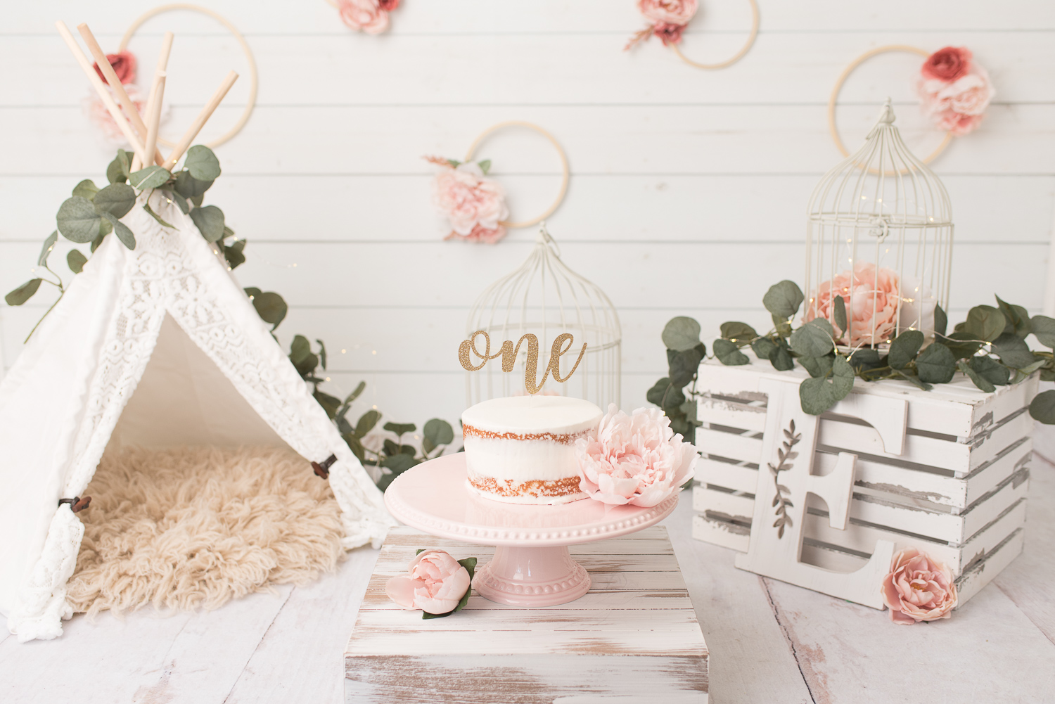 White rustic cake smash set up in Canton, Connecticut