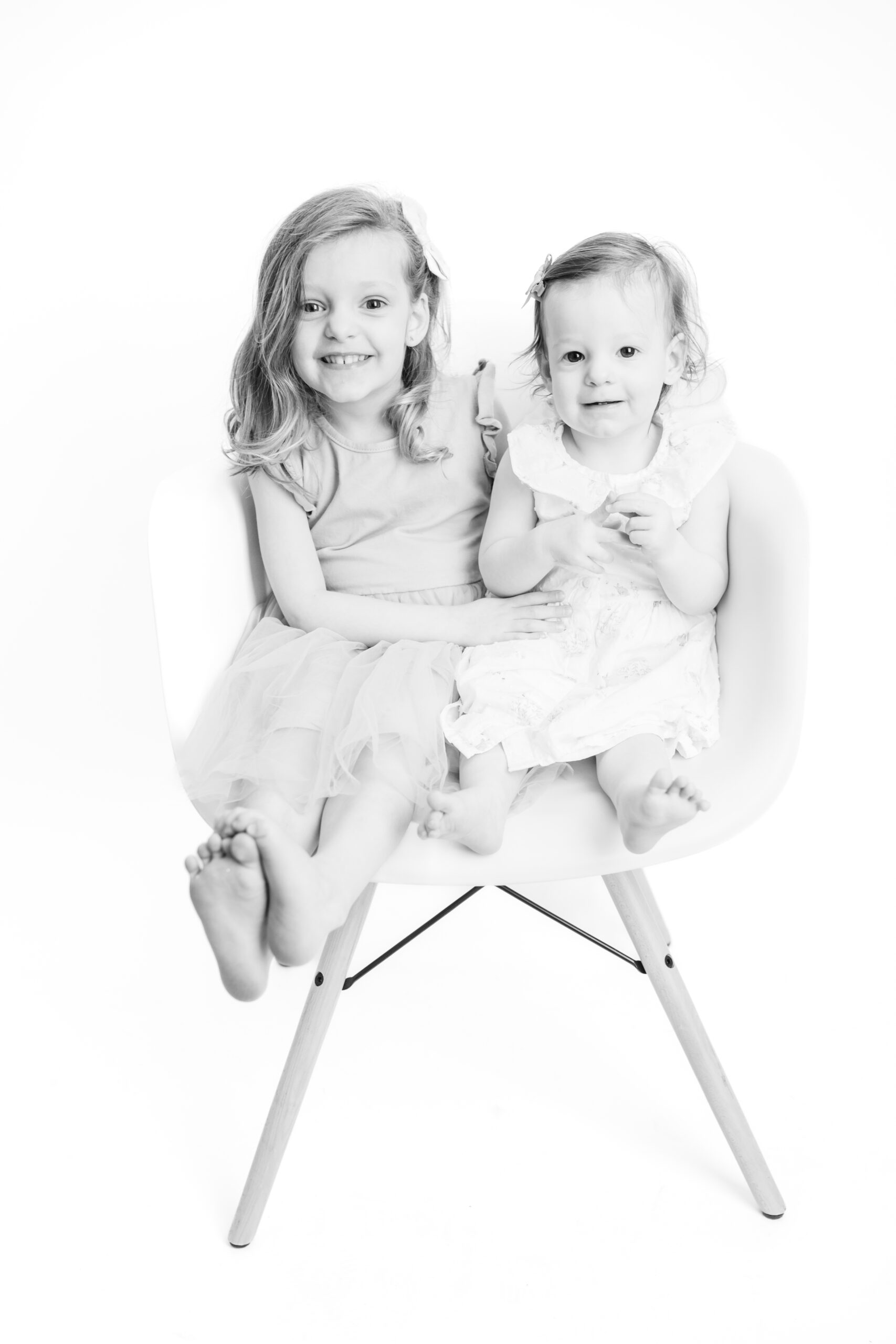 Two sisters at their Personality Portrait session with Sharon Leger Photography